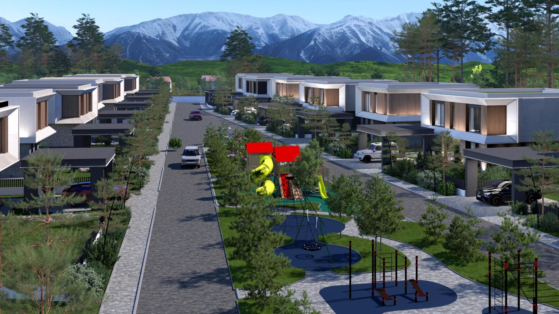 Улица PineWood Village с высоты: два ряда домов, бульвар с детской и спортивной площадками, сосны и снежные горы